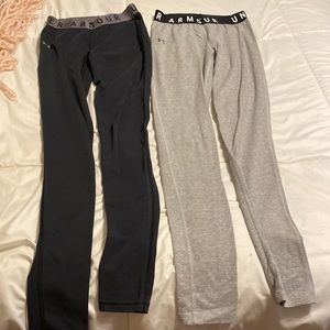 Two pair under armor leggings/base layer/workout tights. Navy and gray.